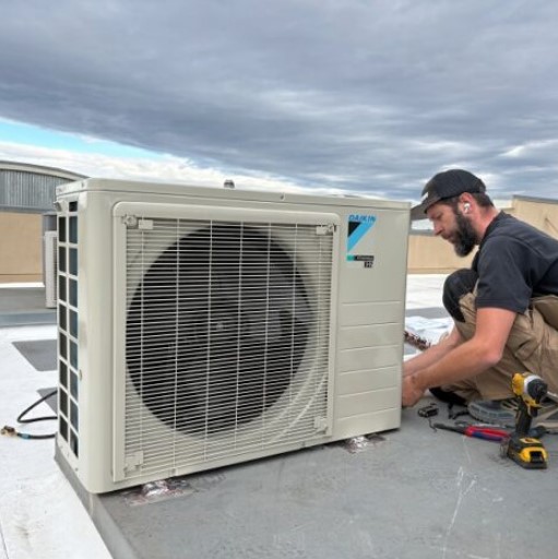 Exterior refrigerant line routing for a ductless mini-split system